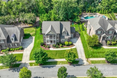 Discover timeless elegance in this full-brick stately Skybrook on Skybrook Golf Club in North Carolina - for sale on GolfHomes.com, golf home, golf lot