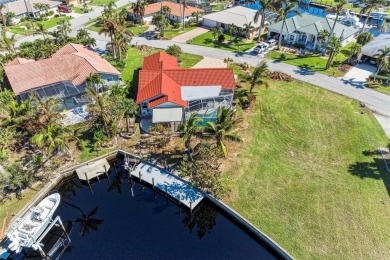 Beautifully updated 3 bedroom, 2 bathroom pool home with dock on on Saint Andrews South Golf Club in Florida - for sale on GolfHomes.com, golf home, golf lot