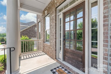 Discover timeless elegance in this full-brick stately Skybrook on Skybrook Golf Club in North Carolina - for sale on GolfHomes.com, golf home, golf lot