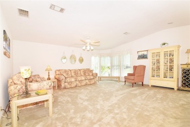 Inviting Triple Wide home on roomy corner double lot. Spacious on Barefoot Bay Golf Course in Florida - for sale on GolfHomes.com, golf home, golf lot