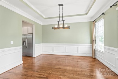Discover timeless elegance in this full-brick stately Skybrook on Skybrook Golf Club in North Carolina - for sale on GolfHomes.com, golf home, golf lot
