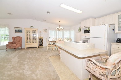 Inviting Triple Wide home on roomy corner double lot. Spacious on Barefoot Bay Golf Course in Florida - for sale on GolfHomes.com, golf home, golf lot