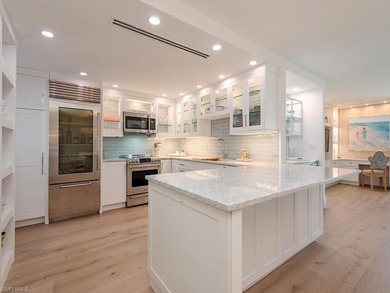 BEAUTIFULLY RENOVATED GULF-VIEW CONDOMINIUM! Step into costal on The Moorings Country Club in Florida - for sale on GolfHomes.com, golf home, golf lot