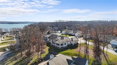 Carefree Lake Living Starts Here at Bello Point! Experience the on The Club At Porto Cima in Missouri - for sale on GolfHomes.com, golf home, golf lot