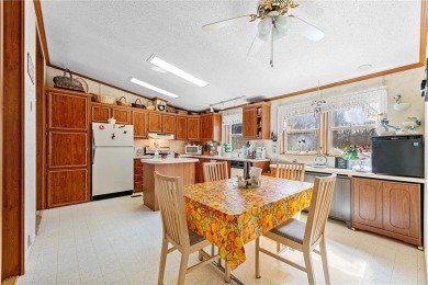 Turn the key and start enjoying lake life from this fully on Hardwoods Golf Club At Mille Lacs in Minnesota - for sale on GolfHomes.com, golf home, golf lot