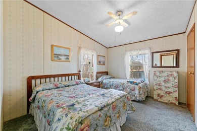 Turn the key and start enjoying lake life from this fully on Hardwoods Golf Club At Mille Lacs in Minnesota - for sale on GolfHomes.com, golf home, golf lot