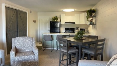 The Complete Condo Package ~ Now Even Better! This charming on Seasons Ridge At Four Seasons in Missouri - for sale on GolfHomes.com, golf home, golf lot