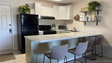 The Complete Condo Package ~ Now Even Better! This charming on Seasons Ridge At Four Seasons in Missouri - for sale on GolfHomes.com, golf home, golf lot