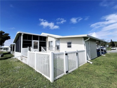 Just in time for your winter enjoyment! Sits by the 15th hole on on Barefoot Bay Golf Course in Florida - for sale on GolfHomes.com, golf home, golf lot