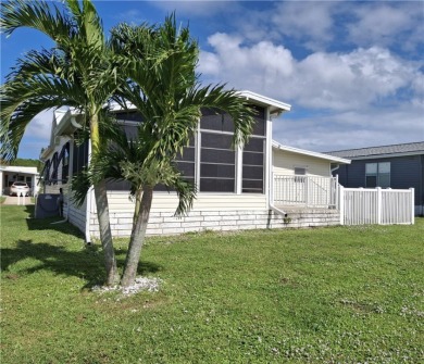 Just in time for your winter enjoyment! Sits by the 15th hole on on Barefoot Bay Golf Course in Florida - for sale on GolfHomes.com, golf home, golf lot