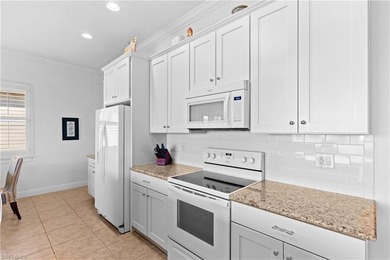 Elegant 2 bedroom + Den, 2 bathroom open concept Valencia model on Pelican Preserve Golf Club in Florida - for sale on GolfHomes.com, golf home, golf lot