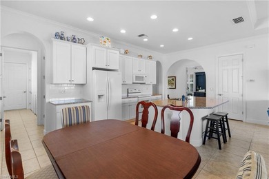 Elegant 2 bedroom + Den, 2 bathroom open concept Valencia model on Pelican Preserve Golf Club in Florida - for sale on GolfHomes.com, golf home, golf lot