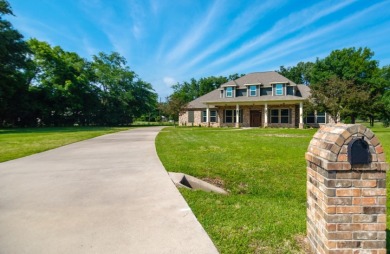 PRICE REDUCED - CUSTOM HOME ON LAKE FORK GOLF COURSE for sale on GolfHomes.com