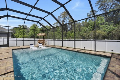 This Palencia pool home offers serene preserve views & plenty of on The Palencia Club in Florida - for sale on GolfHomes.com, golf home, golf lot