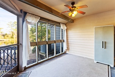 Set on a quiet street with peaceful views of Tradewinds Lake on Harbour Point Golf Club in North Carolina - for sale on GolfHomes.com, golf home, golf lot