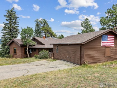 Classic 1920s Estes Park cabin in beautiful condition and full on Estes Park Golf Course in Colorado - for sale on GolfHomes.com, golf home, golf lot