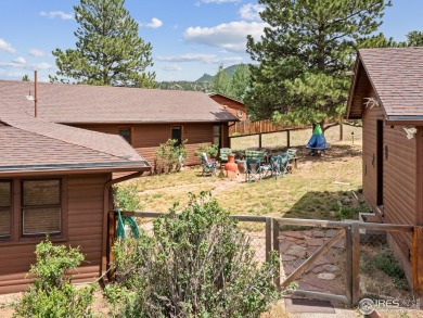 Classic 1920s Estes Park cabin in beautiful condition and full on Estes Park Golf Course in Colorado - for sale on GolfHomes.com, golf home, golf lot