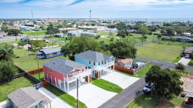 The home is elevated on pilings to allow for covered parking and on Rockport Country Club in Texas - for sale on GolfHomes.com, golf home, golf lot