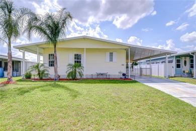 Immaculately maintained Palm Harbor home in picturesque Betmar on Betmar Acres Golf Club in Florida - for sale on GolfHomes.com, golf home, golf lot
