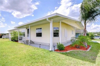 Immaculately maintained Palm Harbor home in picturesque Betmar on Betmar Acres Golf Club in Florida - for sale on GolfHomes.com, golf home, golf lot
