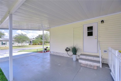Immaculately maintained Palm Harbor home in picturesque Betmar on Betmar Acres Golf Club in Florida - for sale on GolfHomes.com, golf home, golf lot