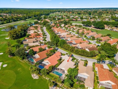 Welcome to this lovely and unique 3-bedroom, 3-bathroom home on Wycliffe Golf and Country Club in Florida - for sale on GolfHomes.com, golf home, golf lot
