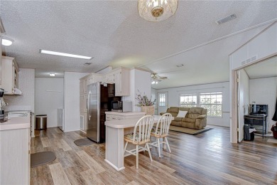 Immaculately maintained Palm Harbor home in picturesque Betmar on Betmar Acres Golf Club in Florida - for sale on GolfHomes.com, golf home, golf lot