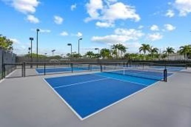 Welcome to this lovely and unique 3-bedroom, 3-bathroom home on Wycliffe Golf and Country Club in Florida - for sale on GolfHomes.com, golf home, golf lot