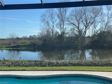 Welcome to your dream home in the desirable Eagle Lakes Golf on Eagle Lakes Golf Club in Florida - for sale on GolfHomes.com, golf home, golf lot