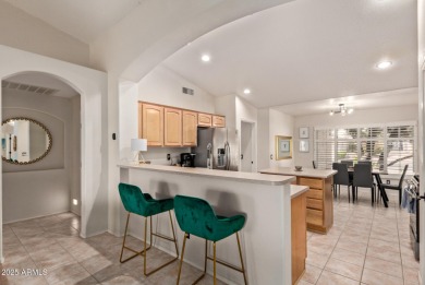 Imagine having your morning coffee  on your covered patio on Tuscany Falls At Pebble Creek in Arizona - for sale on GolfHomes.com, golf home, golf lot