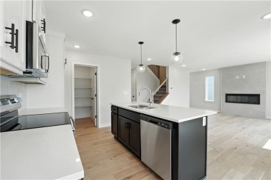 Step into the *Gardenia*, where modern charm and functionality on Golf Club of Creekmoor in Missouri - for sale on GolfHomes.com, golf home, golf lot
