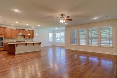 Discover your dream home in this stunning two-bedroom on Frisco Lakes Golf Course in Texas - for sale on GolfHomes.com, golf home, golf lot