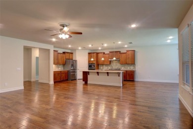 Discover your dream home in this stunning two-bedroom on Frisco Lakes Golf Course in Texas - for sale on GolfHomes.com, golf home, golf lot