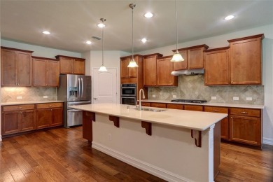 Discover your dream home in this stunning two-bedroom on Frisco Lakes Golf Course in Texas - for sale on GolfHomes.com, golf home, golf lot