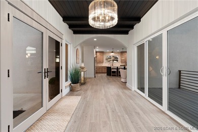 Experience luxury in this stunning 5,500 sq ft home that blends on The Club At Porto Cima in Missouri - for sale on GolfHomes.com, golf home, golf lot