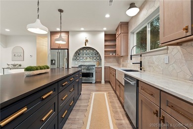 Experience luxury in this stunning 5,500 sq ft home that blends on The Club At Porto Cima in Missouri - for sale on GolfHomes.com, golf home, golf lot