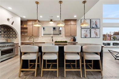 Experience luxury in this stunning 5,500 sq ft home that blends on The Club At Porto Cima in Missouri - for sale on GolfHomes.com, golf home, golf lot