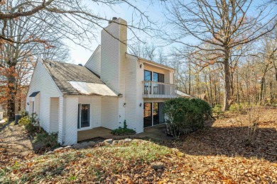 This contemporary home is located on the golf course in the on Diamondhead Golf and Country Club in Arkansas - for sale on GolfHomes.com, golf home, golf lot