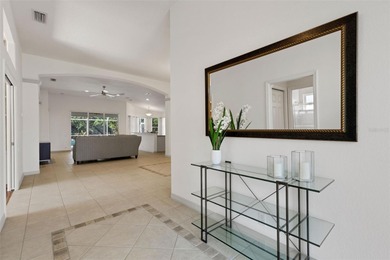 POOLSIDE PARADISE IN RIVER CLUB! Enjoy maintenance-free living on The River Club in Florida - for sale on GolfHomes.com, golf home, golf lot