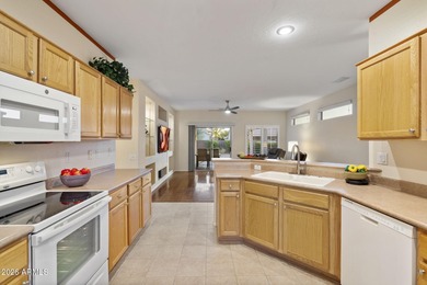 Elevate your lifestyle in the heart of The Grand. Whether you're on Sun City Grand Golf Couse and Club in Arizona - for sale on GolfHomes.com, golf home, golf lot