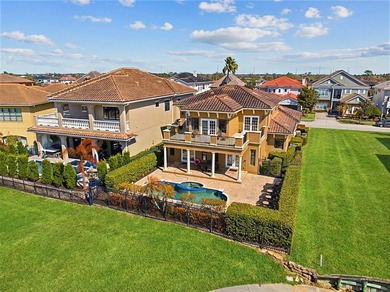 Wake up to golf course views and end your day poolside in this on ChampionsGate Golf Resort in Florida - for sale on GolfHomes.com, golf home, golf lot