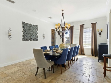 Wake up to golf course views and end your day poolside in this on ChampionsGate Golf Resort in Florida - for sale on GolfHomes.com, golf home, golf lot