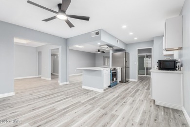 A gorgeous remodeled 3 bed, 2 bath townhouse on a golf course in on Sun City Country Club in Arizona - for sale on GolfHomes.com, golf home, golf lot