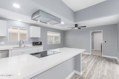 A gorgeous remodeled 3 bed, 2 bath townhouse on a golf course in on Sun City Country Club in Arizona - for sale on GolfHomes.com, golf home, golf lot