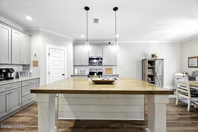 Beautifully maintained and move-in ready, this 5 bedroom, 4 bath on Canongate At Healy Point Country Club in Georgia - for sale on GolfHomes.com, golf home, golf lot