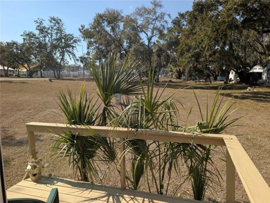 This adorable mobile home is ready for its next owner! The home on River Run Golf Links in Florida - for sale on GolfHomes.com, golf home, golf lot