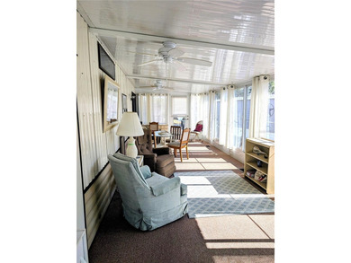 This adorable mobile home is ready for its next owner! The home on River Run Golf Links in Florida - for sale on GolfHomes.com, golf home, golf lot