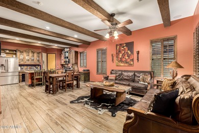 Charming Spanish-style single-level pool home in the heart of on Verrado Golf Club  in Arizona - for sale on GolfHomes.com, golf home, golf lot