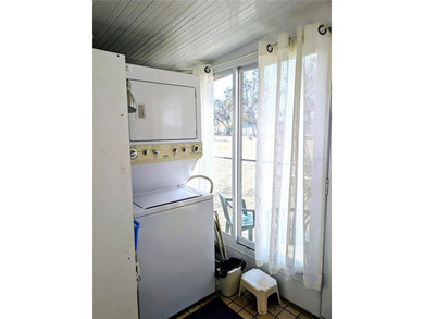 This adorable mobile home is ready for its next owner! The home on River Run Golf Links in Florida - for sale on GolfHomes.com, golf home, golf lot