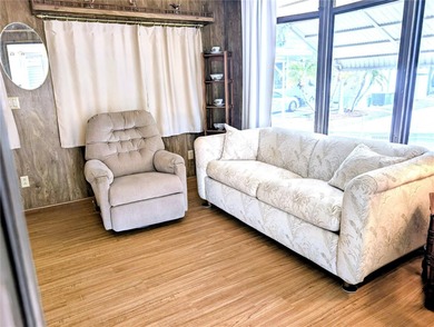 This adorable mobile home is ready for its next owner! The home on River Run Golf Links in Florida - for sale on GolfHomes.com, golf home, golf lot